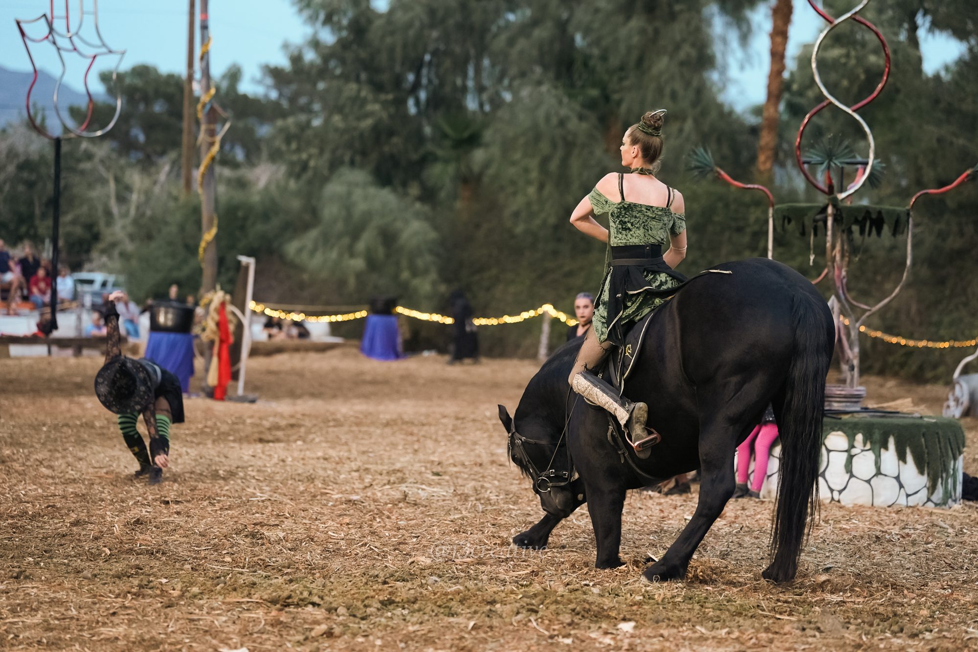 Alina riding as her horse bows